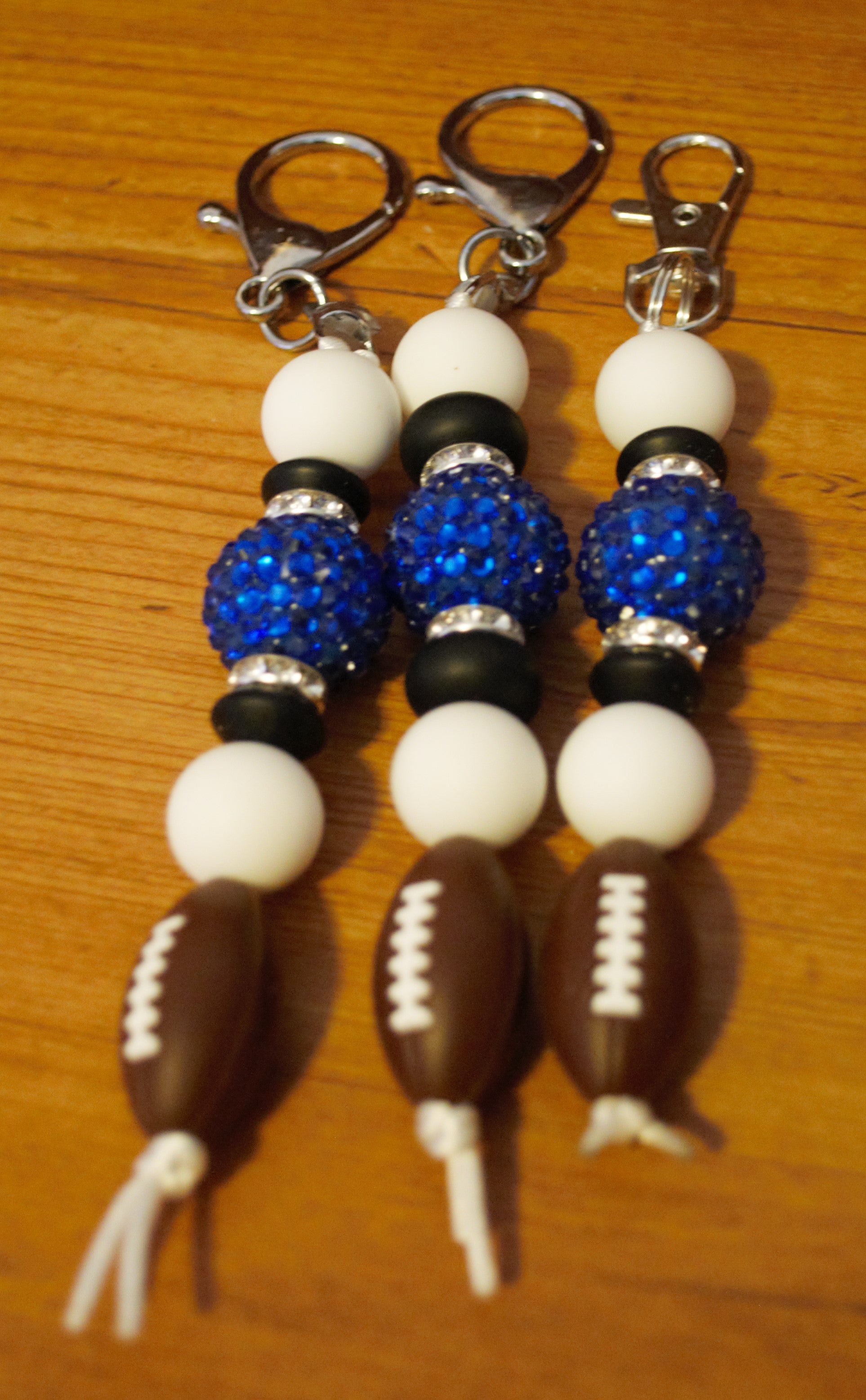 Blue & White Football Zipper/Fan Pulls
